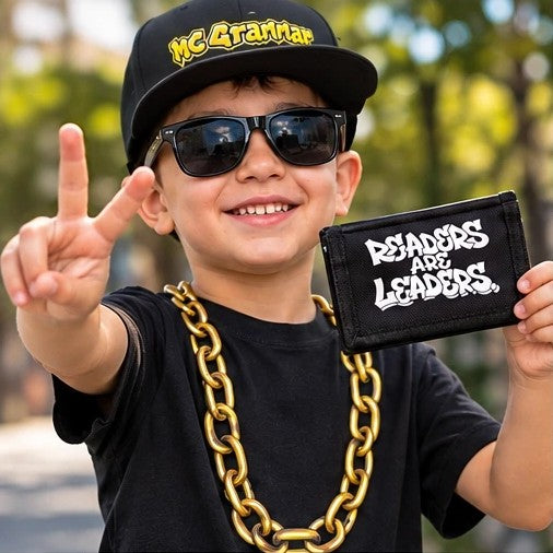 Kid in cap and shades making a peace sign with the Readers are Leaders wallet