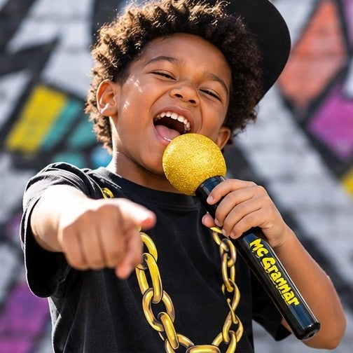 Kid rapping into the gold mic
