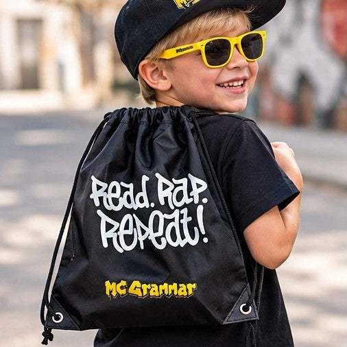 Kid wearing the Read. Rap. Repeat! bag on their back